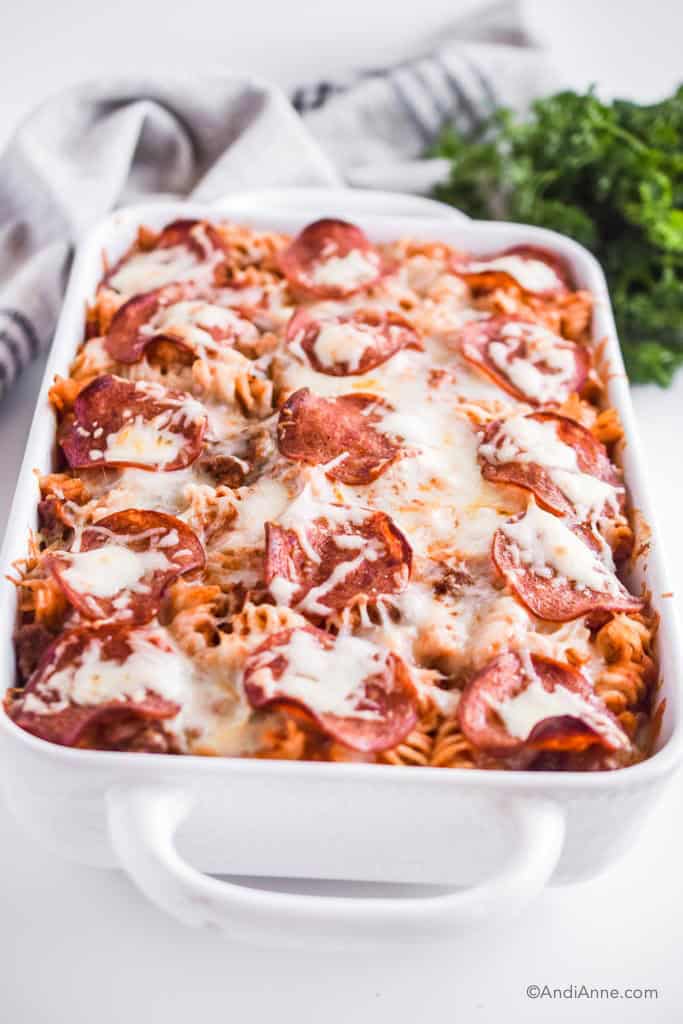 pizza pasta bake close up detail of cooked pepperoni and cheese surface