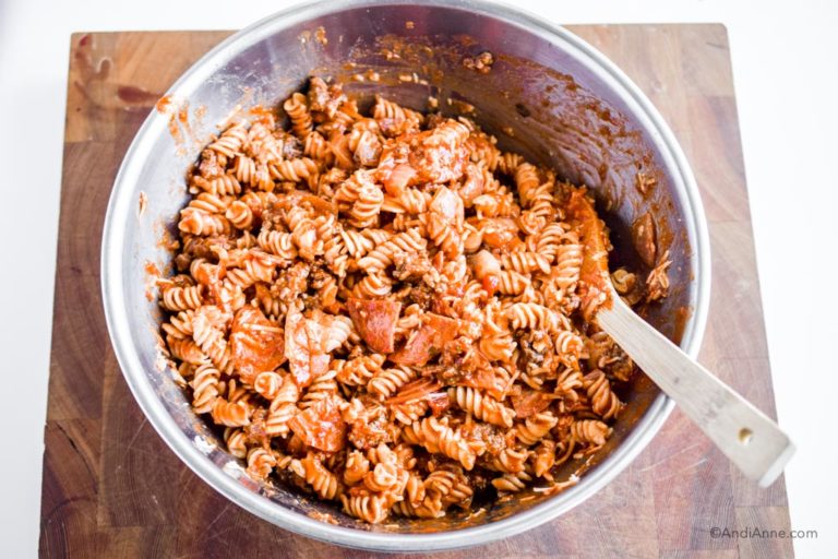 pasta, sauce and ground beef in a steel bowl