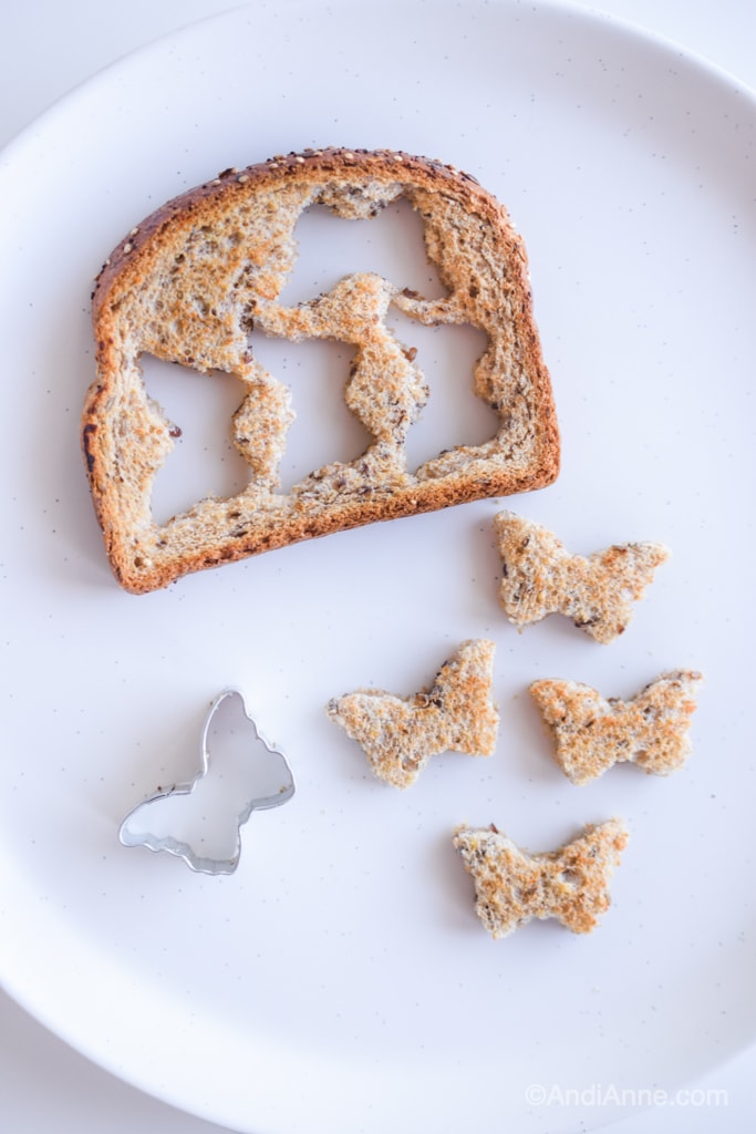 butterfly shapes cut out of toast with a mini cookie cutter