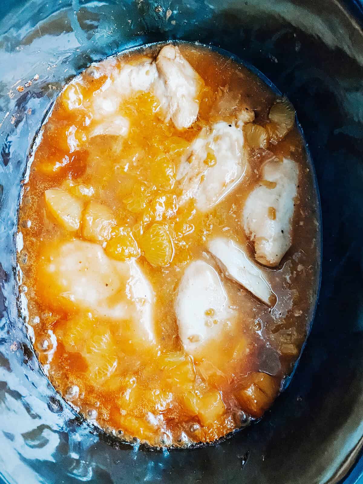 close up detail of ingredients cooking in a slow cooker