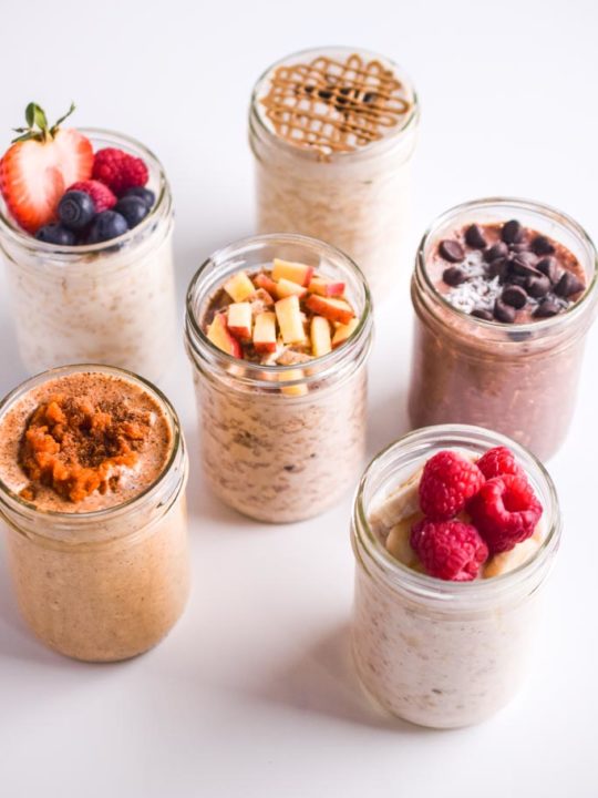 six healthy overnight oat recipes with fresh toppings like apple, raspberries, chocolate chips.