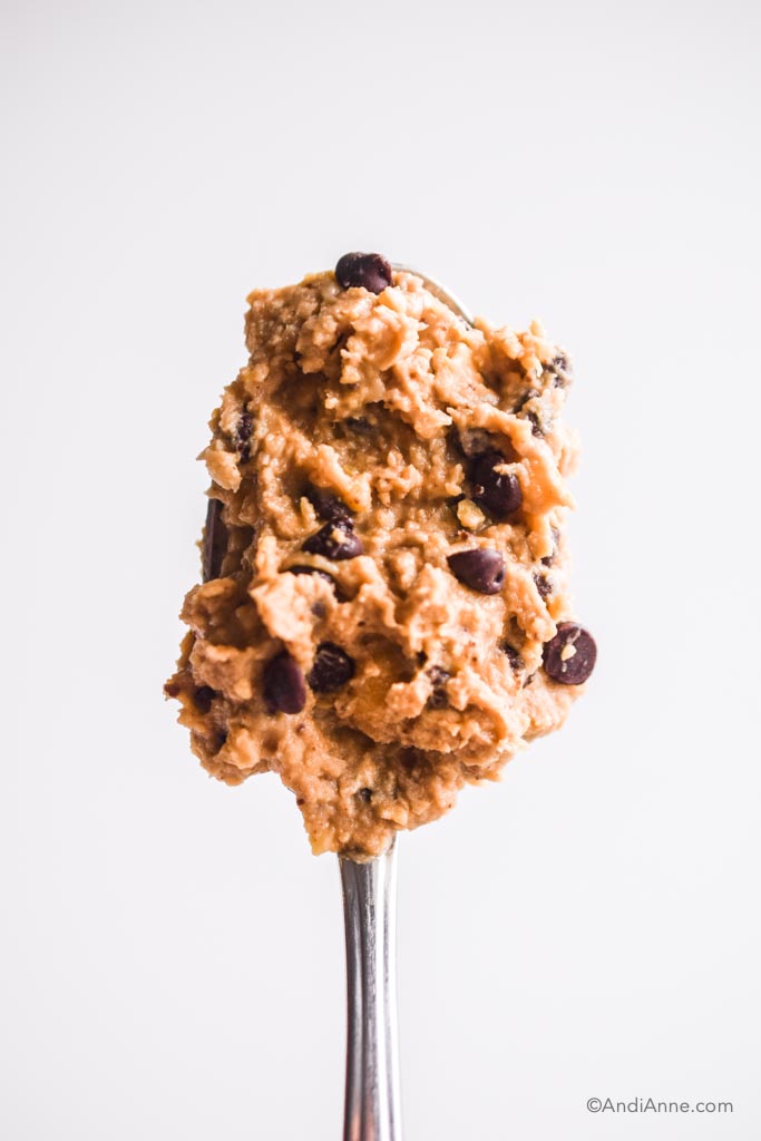 Spoon with cookie dough recipe on it.