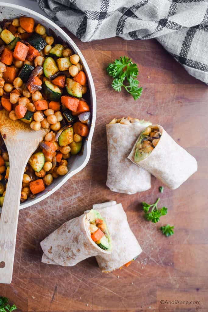 stir fry in frying pan on the left side and chickpea wraps on the right side.