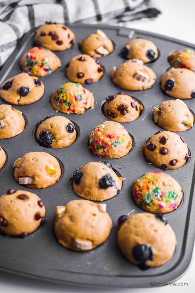 cooked pancake mini muffins inside a muffin pan