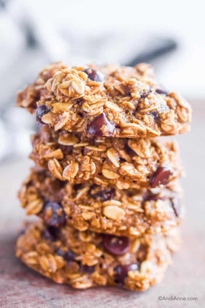 four oatmeal cookies stacked on top of eachother