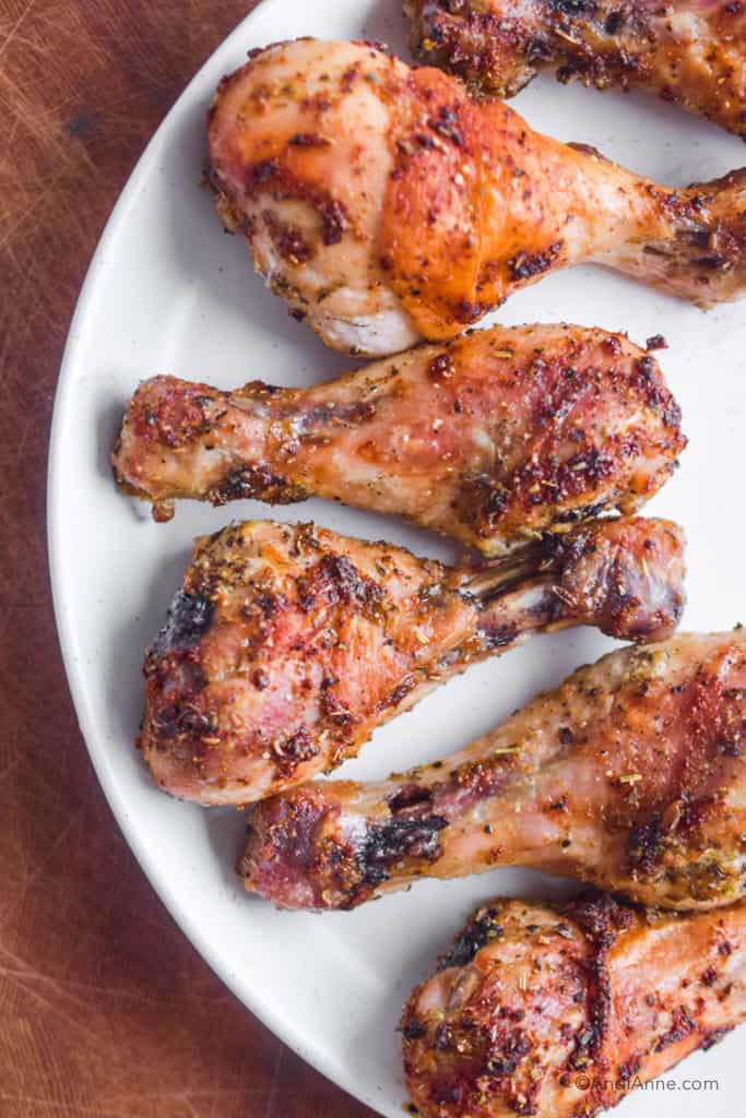 oven baked chicken legs on a white plate