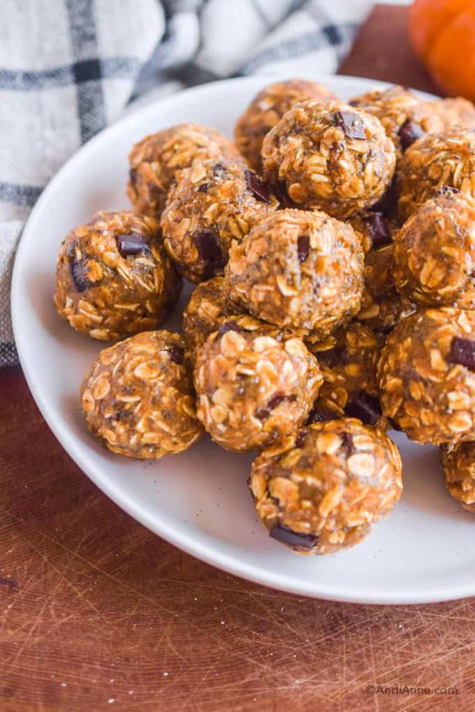 Side angle of white plate with the energy balls