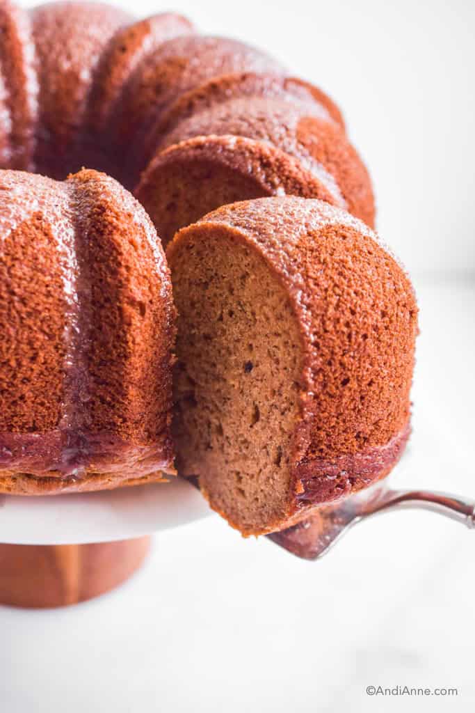 Close up of slice being removed from the bundt cake.