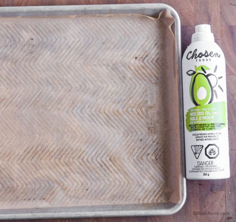 baking sheet with parchment and avocado oil on side