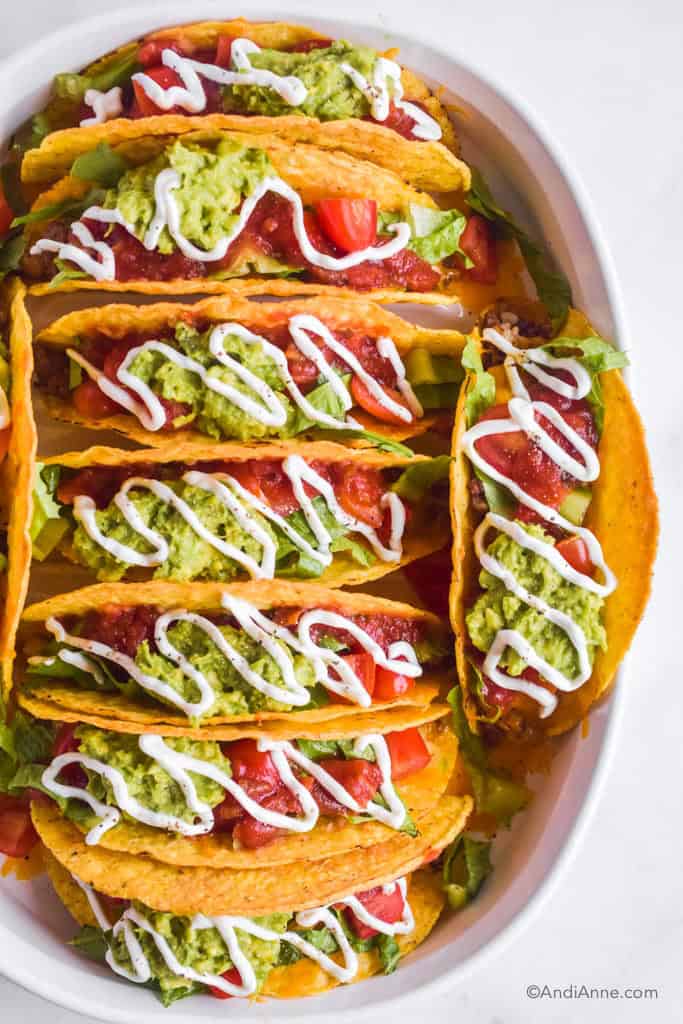 Looking down at the white casserole dish of Beef Rice Chickpea Tacos.