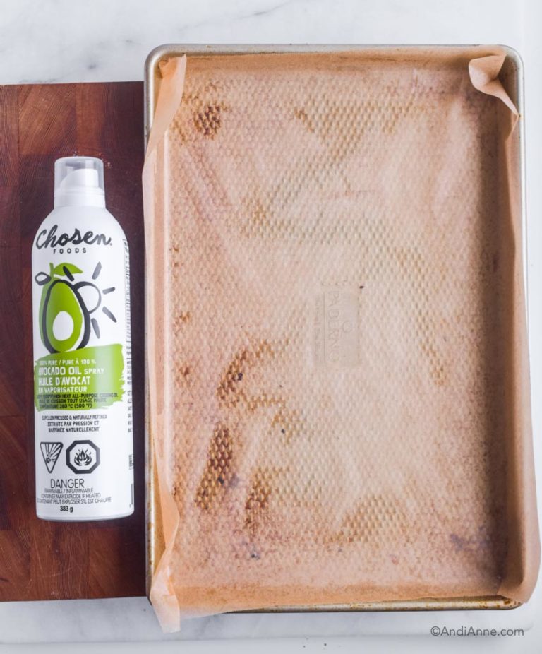 baking sheet with avocado oil spray beside it.