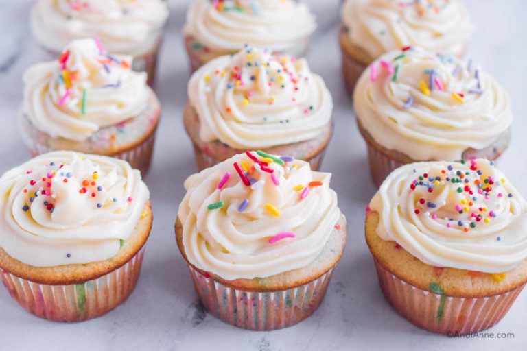 confetti cupcakes with vanilla frosting and sprinkles