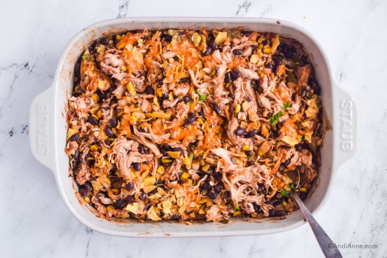 shredded barbecue chicken casserole with spoon on side