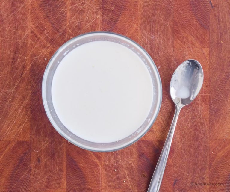 bowl of milk and lemon juice with spoon