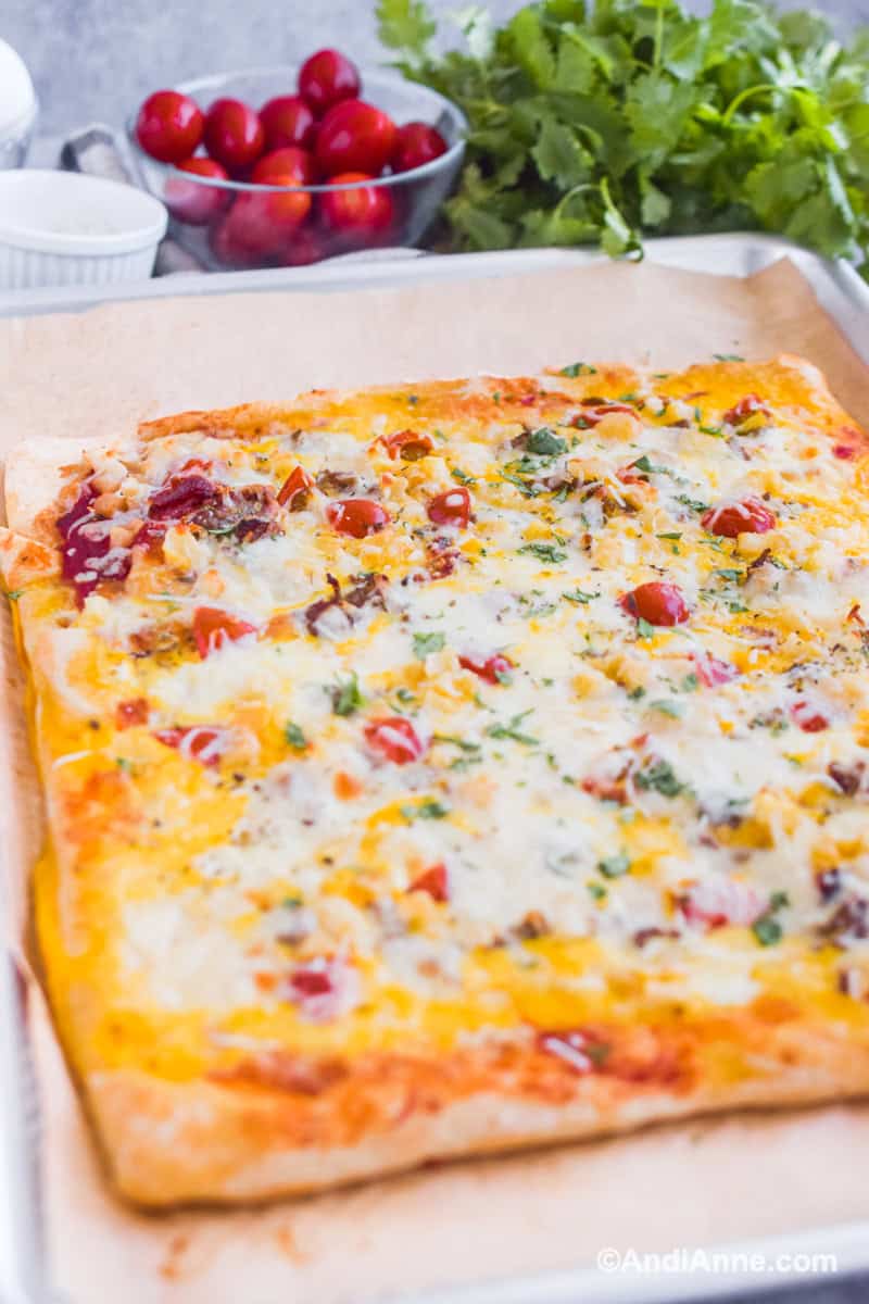 Close up of pizza before it's cut.