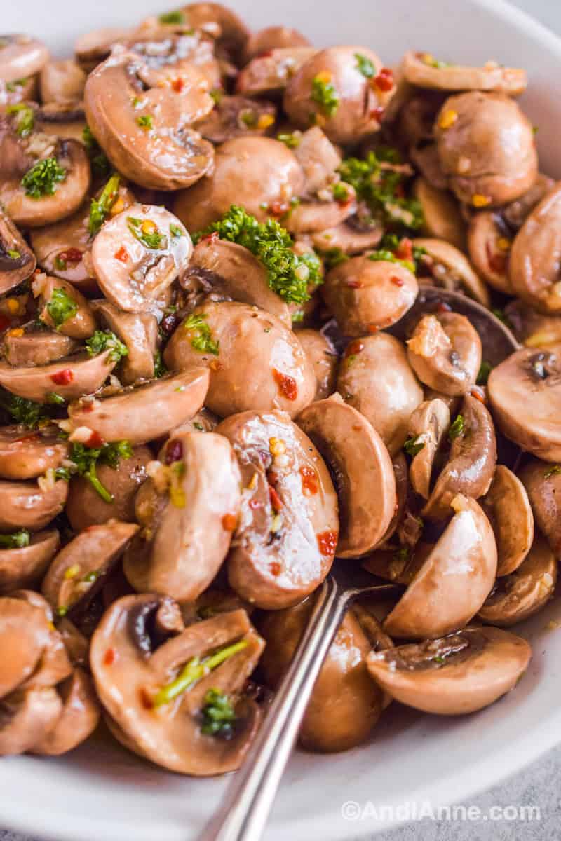 Close up of marinated mushrooms.