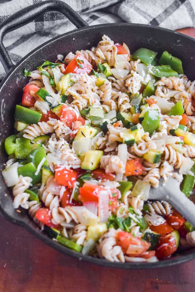 Close up of vegetable parmesan pasta in skillet recipe.