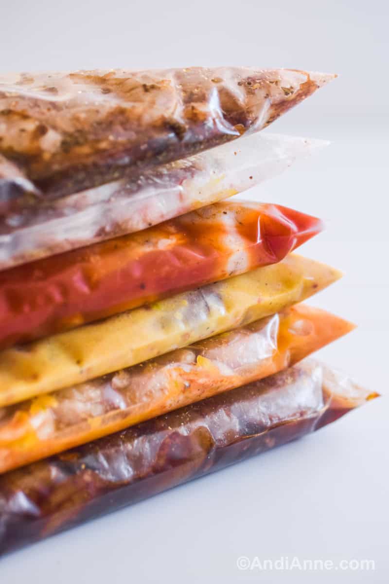 Close up of the bags with marinade and shrimp stacked on top of eachother.