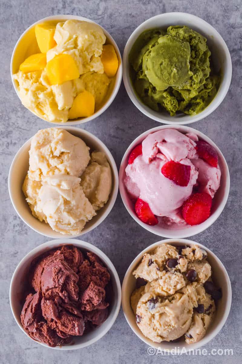 Looking down at six bowls of tofu ice cream that are mango, matcha, vanilla, strawberry, chocolate, peanut butter and chocolate chip.