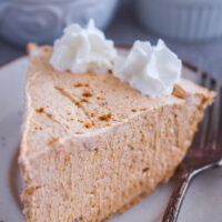 A slice of no bake pumpkin marshmallow pie