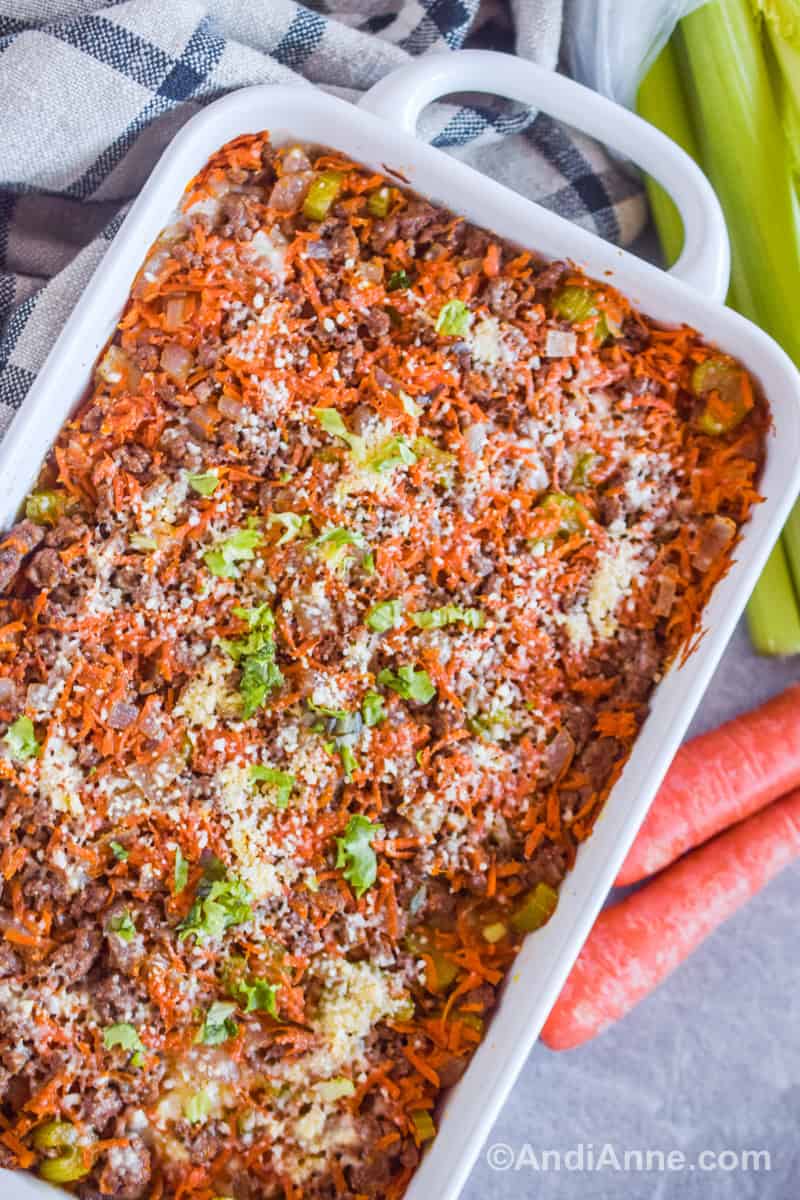 Ground beef mushroom rice recipe in a white casserole dish.