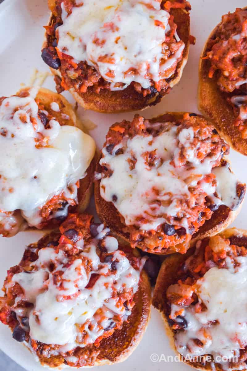Close up of pizza sloppy joes on a white plate.