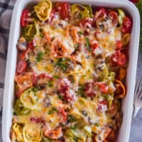 Tortellini casserole in a white dish.
